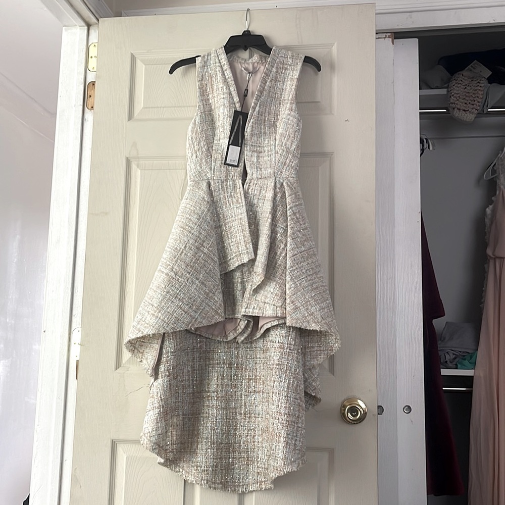 GORGEOUS HIGH LOW ROMPER. NWT . Never worn.